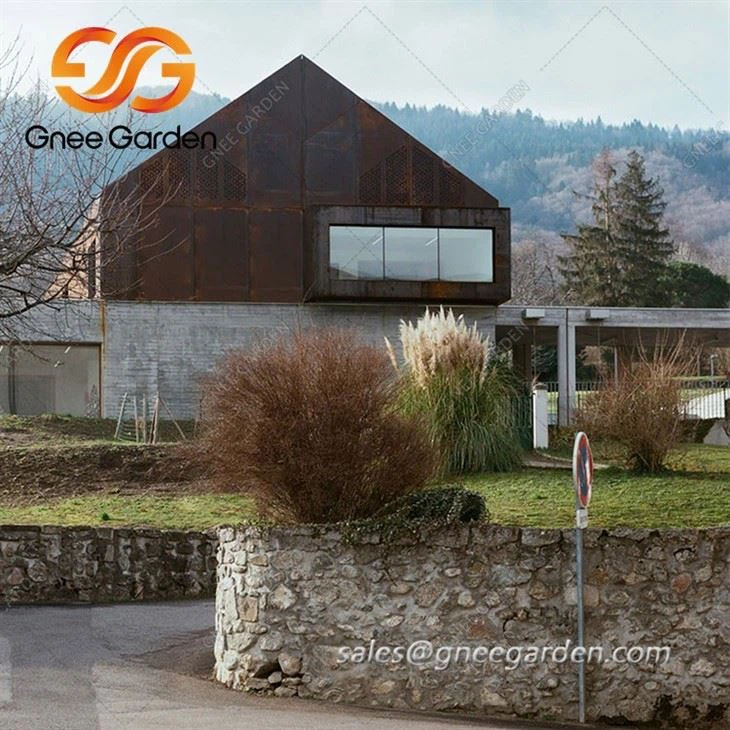 Corten-Steel-and-Concrete-School-Overlooks-Lake-(3)